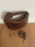 SUEDE KNOT CLUTCH
