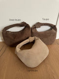 SUEDE KNOT CLUTCH